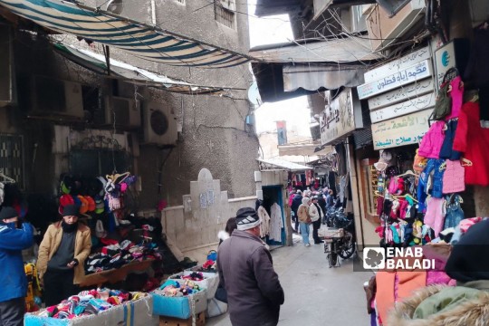 Syrian society overcomes stigma of second-hand clothing -Syria